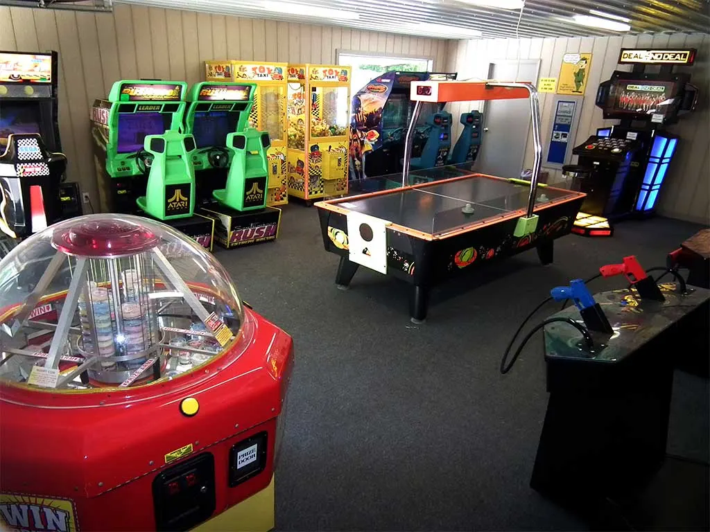 Arcade games and air hockey inside the game room