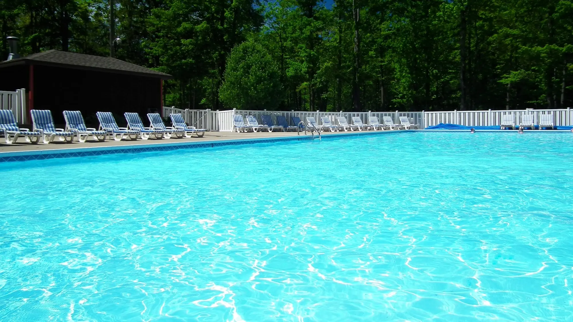 Bright blue water in the Dune Town heated pool