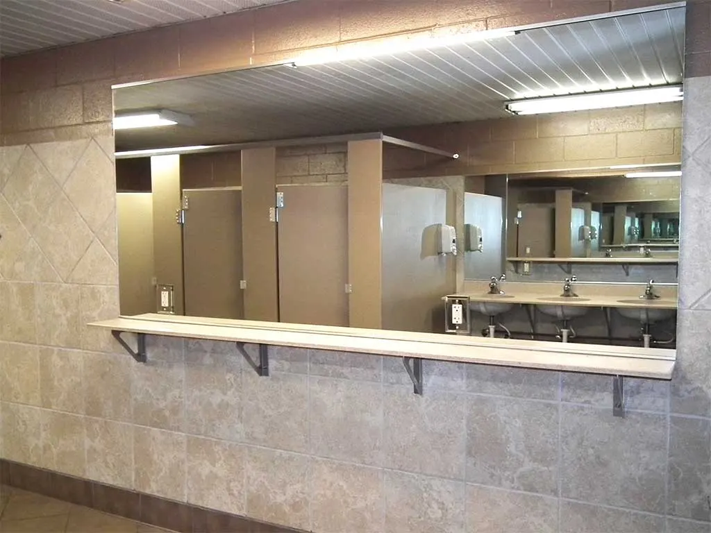 Clean bath house sinks and mirrors